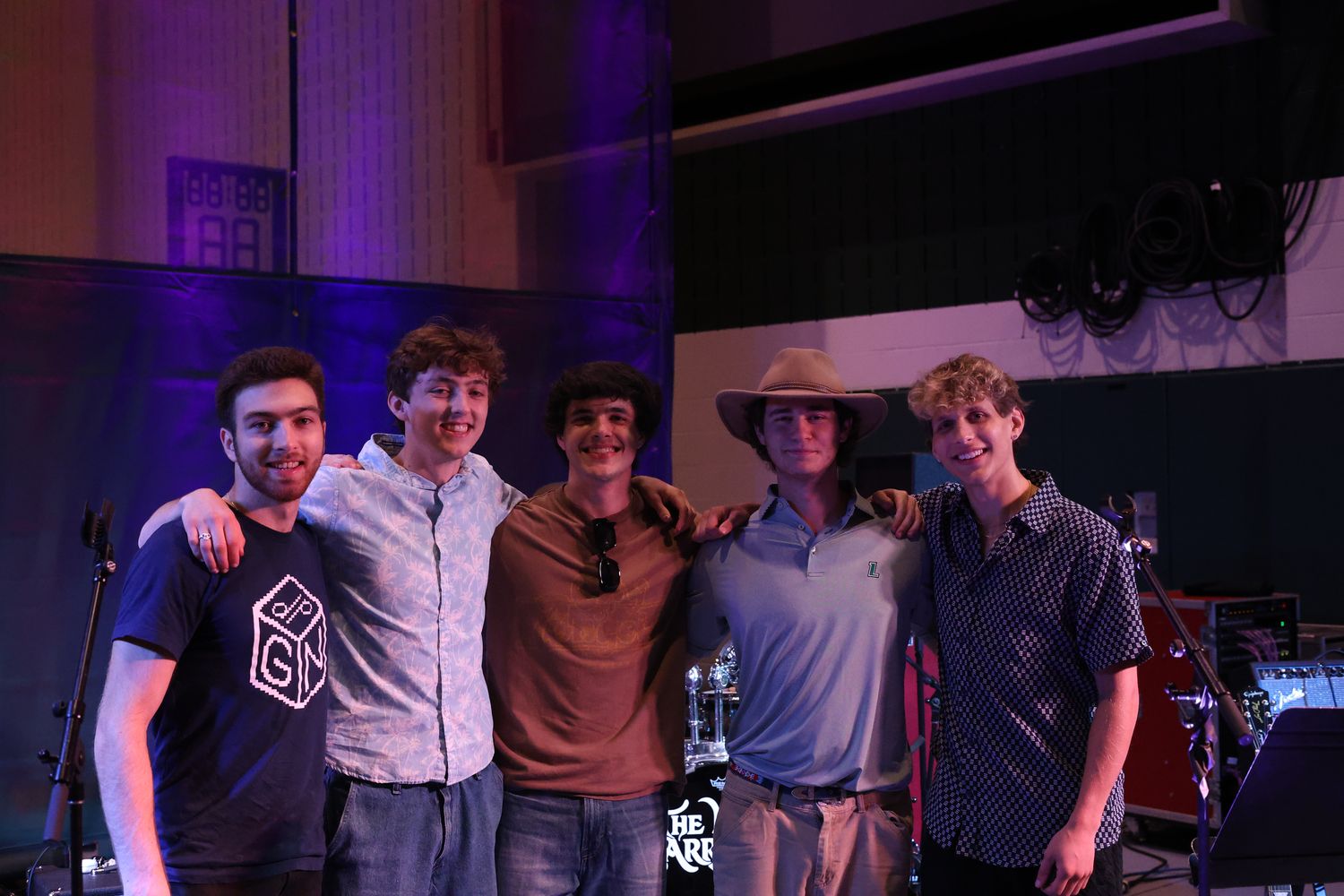 The five members of The Last Arrival on stage