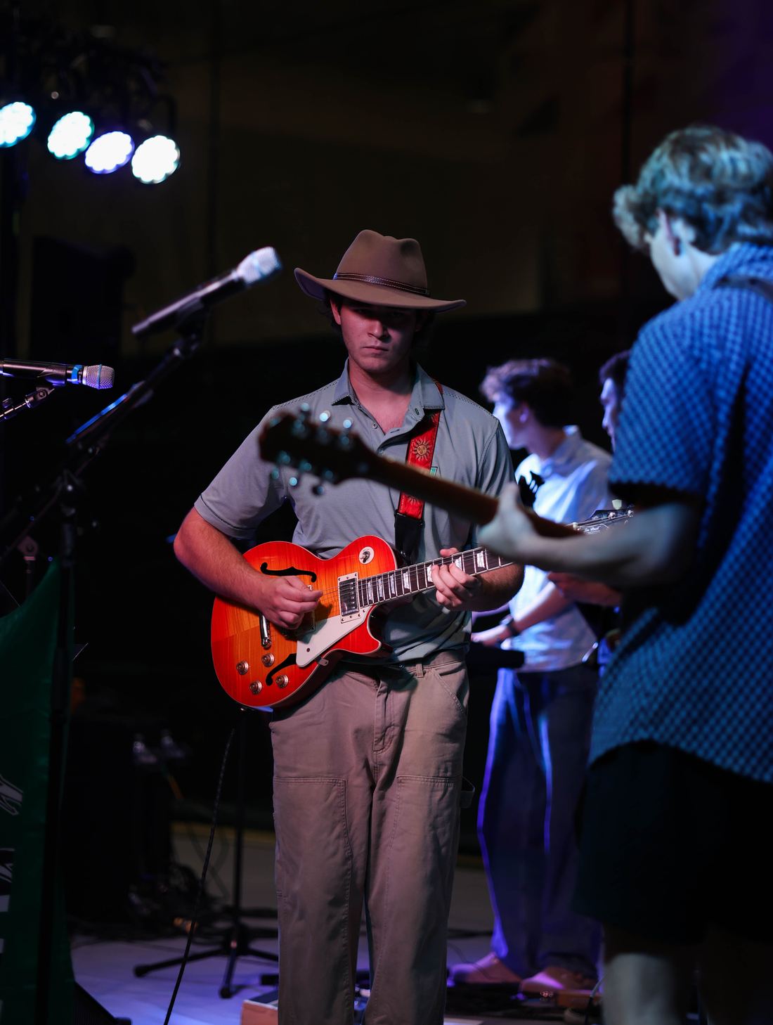 Guitarist in a wide-brimmed hat